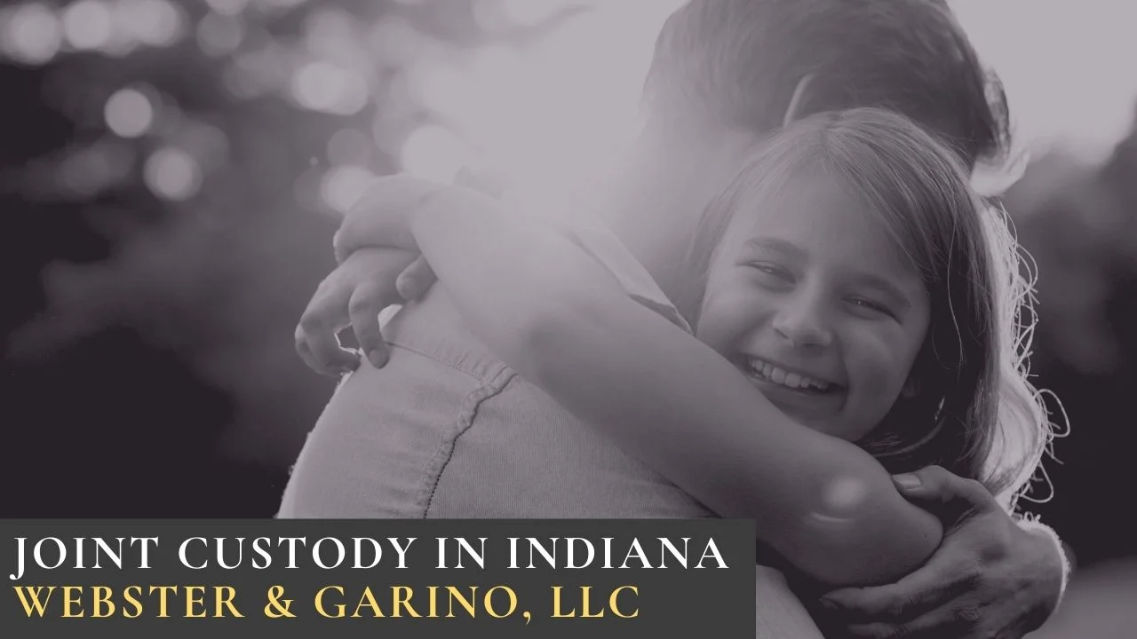A child smiles while hugging an adult, symbolizing compassionate legal guidance from an Indiana law firm.| Webster & Garino, LLC | Indiana Law Firm serving Hamilton County