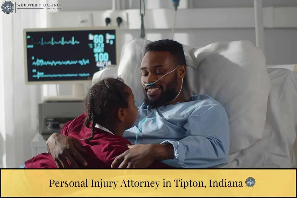 daughter hugging her dad in hospital bed recovering from accident. | Personal Injury Attorney in Tipton, IN | Accident & Injury Claims