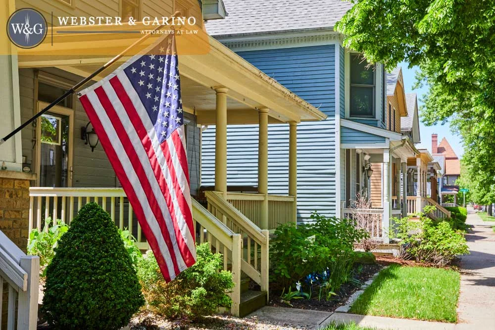 American flag on Indiana home porch representing family and estate planning with Webster & Garino