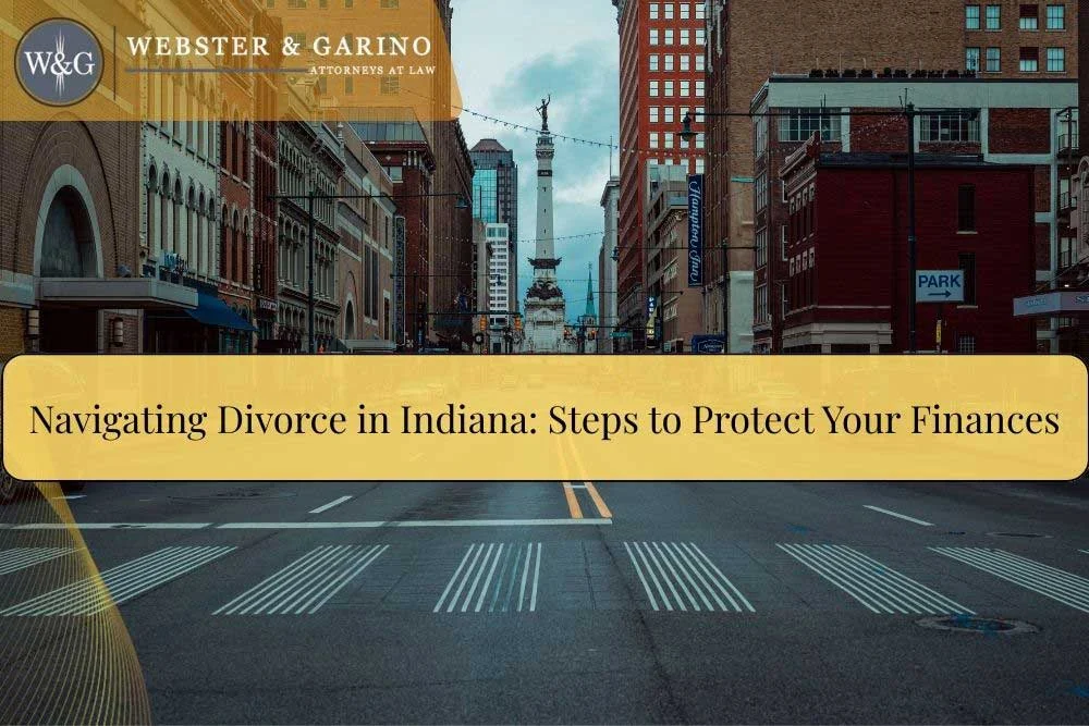 Downtown Indiana street view with Webster & Garino Attorneys at Law banner, highlighting divorce financial protection steps